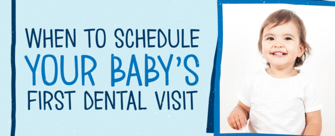 smiling baby at first dentist visit